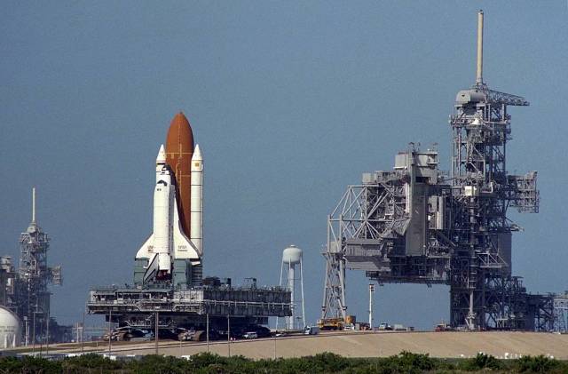 The space shuttle Endeavour rolls from Launch Pad 39A to Launch Pad 39B. The rare pad switch was deemed necessary after contamination was discovered in the payload changeout room at Pad A. 