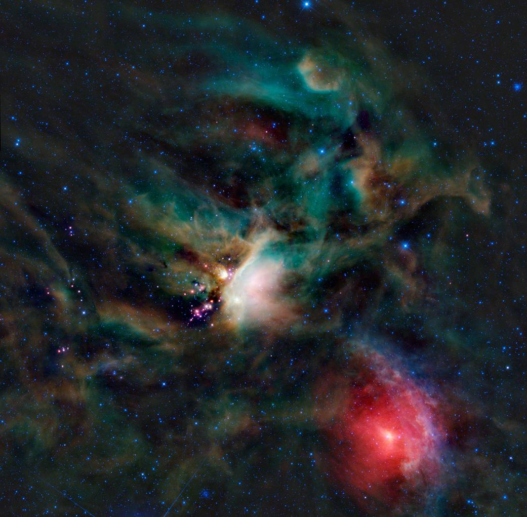 Brightly colored clouds of gas with a brilliant red spot at bottom right, white spot at center, green near top