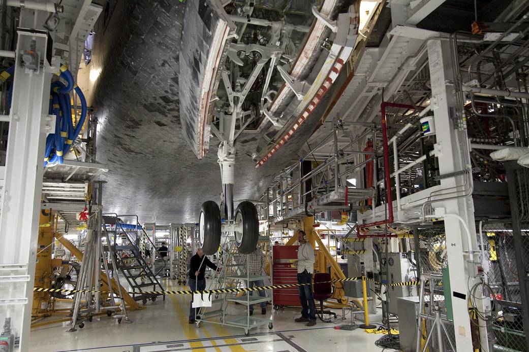 Space shuttle Atlantis goes through a routine landing gear test in Orbiter Processing Facility-1 at NASA's Kennedy Space Center in Florida.