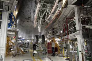 Space shuttle Atlantis goes through a routine landing gear test in Orbiter Processing Facility-1 at NASA's Kennedy Space Center in Florida.