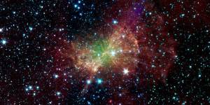 The Dumbbell nebula, also known as Messier 27, pumps out infrared light in this image from NASA Spitzer Space Telescope.