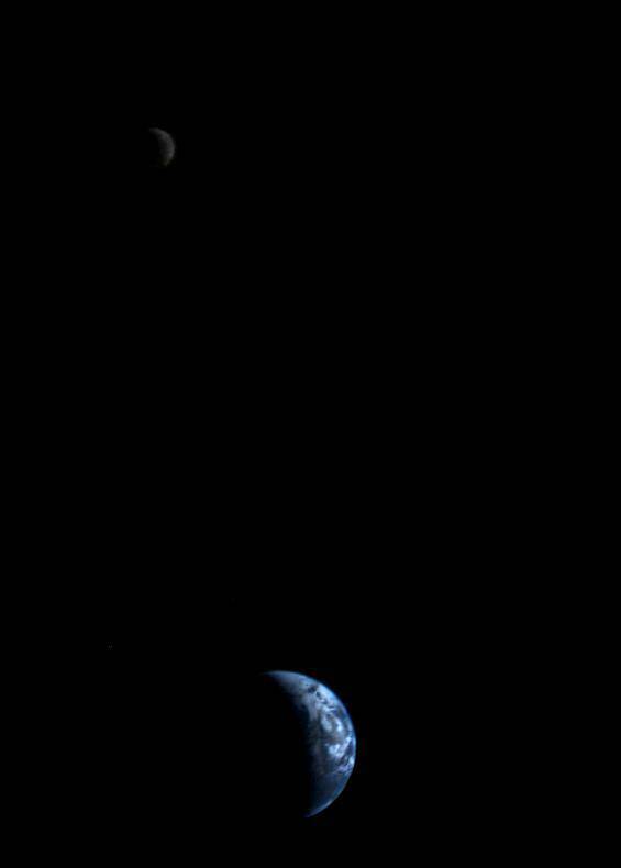 Earth and moon photographed by Voyager spacecraft