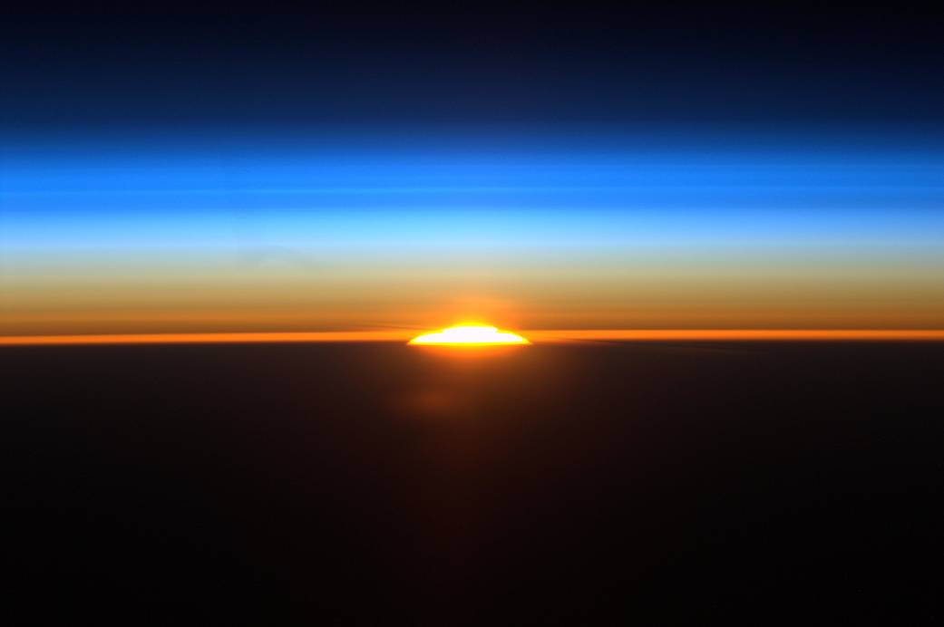 This image shows the rising sun as the International Space Station flew along a path between Rio de Janeiro, Brazil and Buenos A