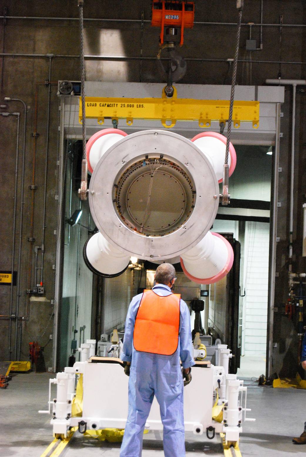 Workers Prepare to Ship the Abort Motor