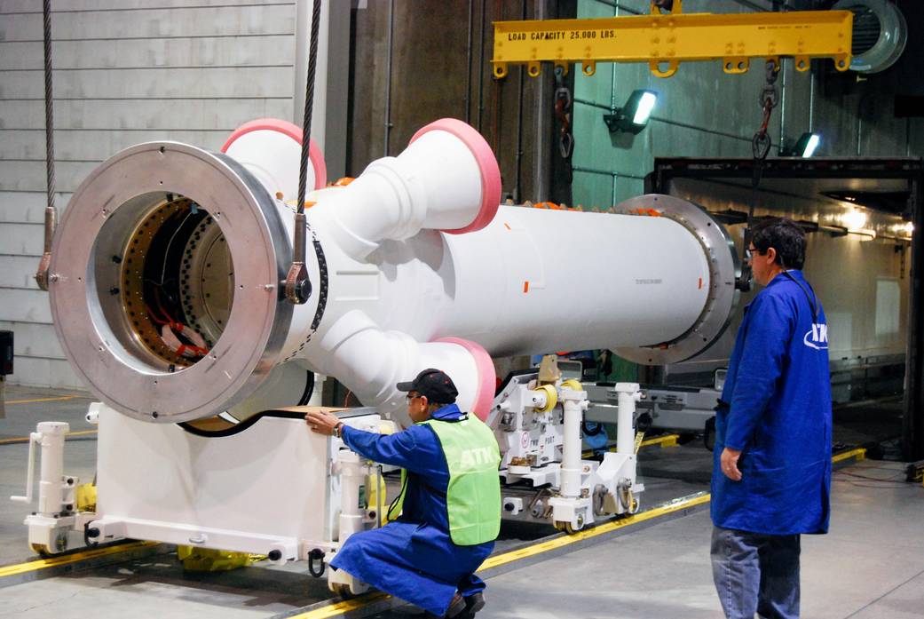 Workers Prepare to Ship the Abort Motor