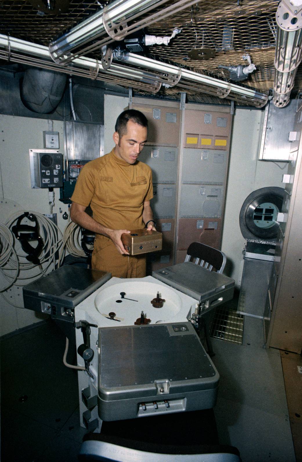 Astronaut Crippen With Skylab Training Hardware