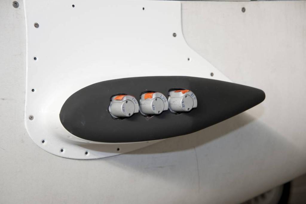 Miniature Differential Optical Absorption Spectrometer on Global Hawk