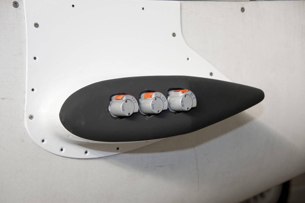 Miniature Differential Optical Absorption Spectrometer on Global Hawk