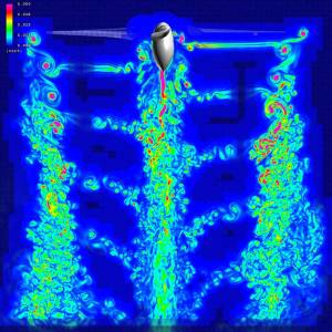 This snapshot of a V-22 rotorcraft in hover shows a cross-section of the blade vortices and turbulent flow, where magenta is high vorticity (spin) and blue is low.