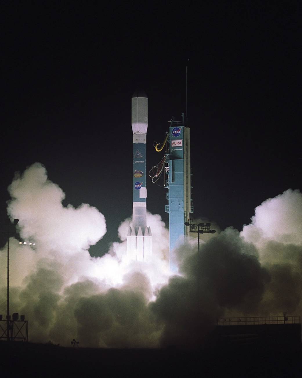 Nighttime rocket launch with Aura spacecraft 
