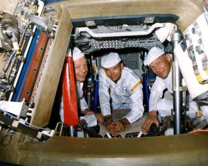 The Apollo 11 crew performs a walk-through egress test. The hands-on test was in preparation for the first manned lunar landing mission.