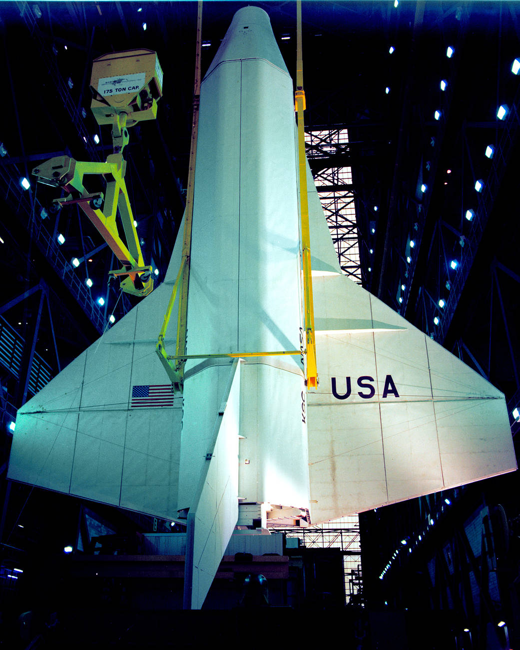 At NASA's Kennedy Space Center in Florida, the space shuttle mock-up, dubbed Pathfinder, undergoes a lift test in the Vehicle Assembly Building. 