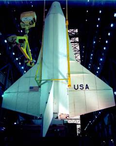 At NASA's Kennedy Space Center in Florida, the space shuttle mock-up, dubbed Pathfinder, undergoes a lift test in the Vehicle Assembly Building.