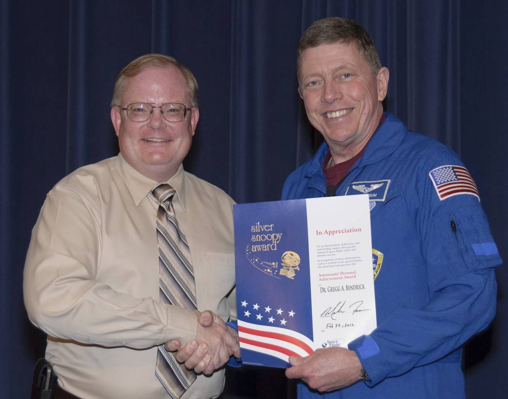 Silver Snoopy Award to Dr. Gregg Bendrick