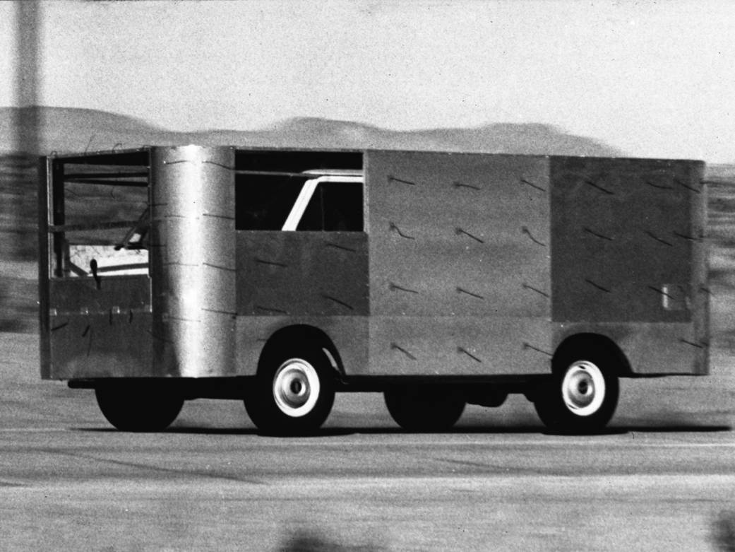 Black and white image of a modified Van