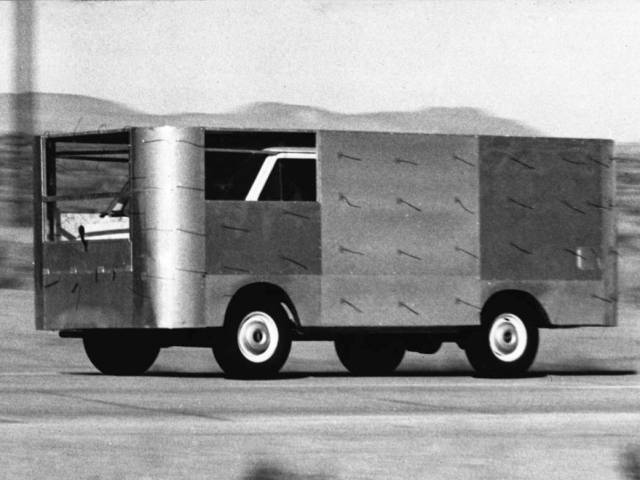 Black and white image of a modified Van