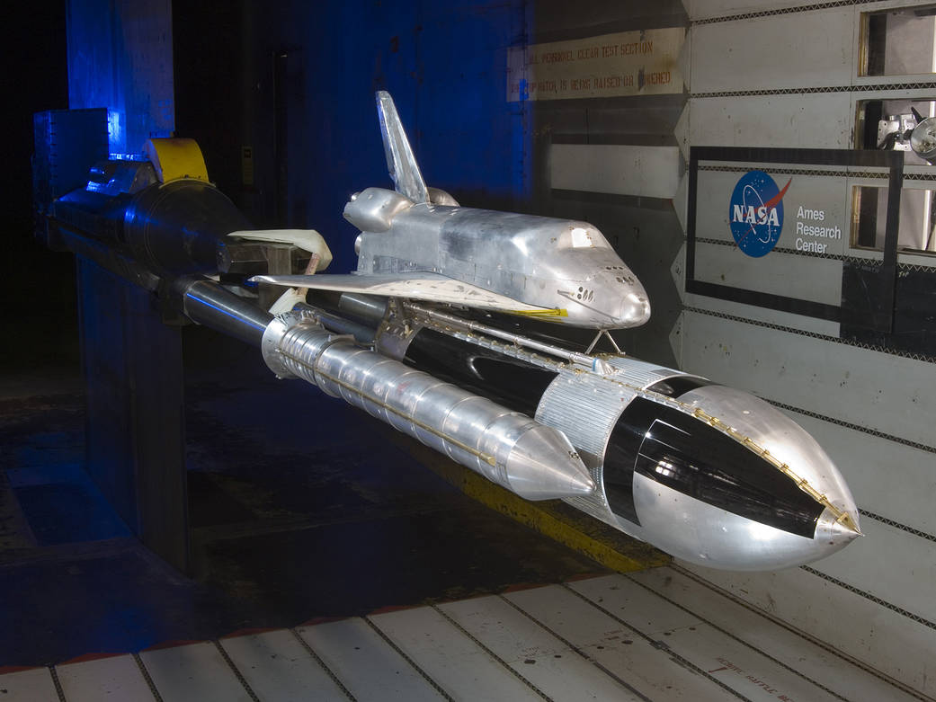 model of Space Shuttle and rocket in a wind tunnel