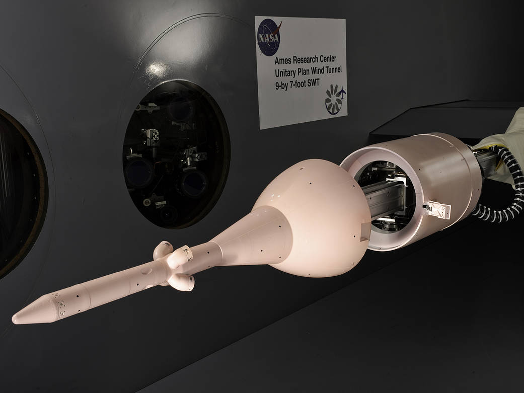 model of Crew Exploration Vehicle painted pink in wind tunnel