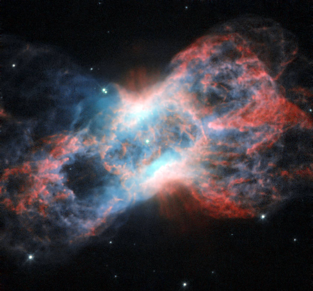 Hubble Sees a Celestial Swan and Butterfly