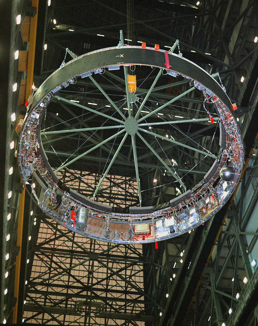 In January 1967, the Saturn V instrument unit, the "brains" that controlled the giant launch vehicle was hoisted during the fina