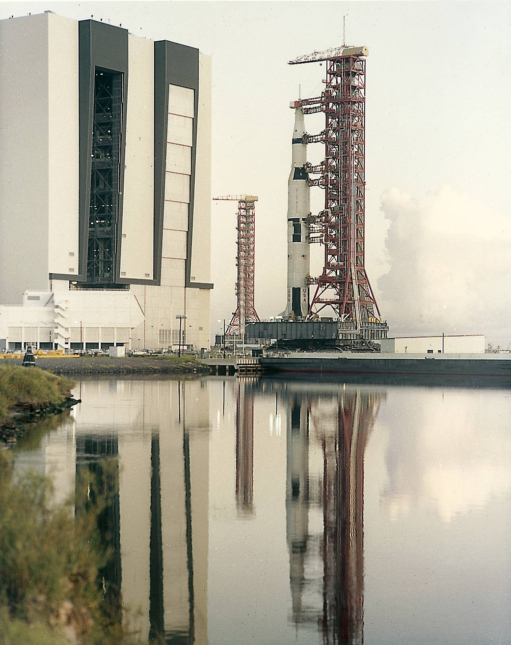 In August 1967, the Saturn V vehicle (AS-501), rolled out to the launch pad in preparation for its first launch. 