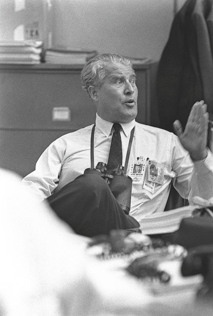 Dr. von Braun relaxes after the successful launch of Apollo 11.