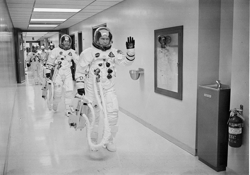 Commander Colonel Frank Borman leads the way as he, Command Module Pilot Captain James A Lovell Jr., and Lunar Module Pilot Majo