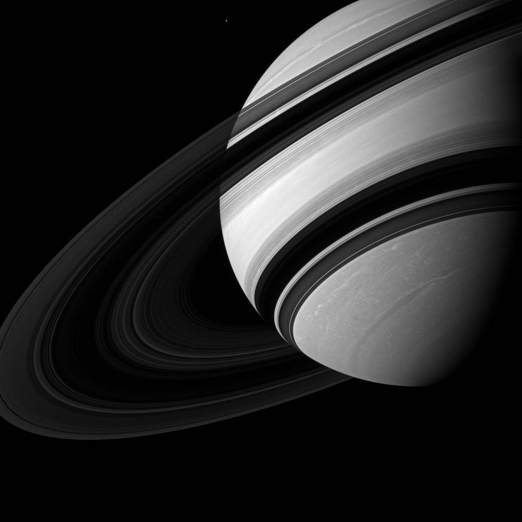 Dwarfed by Saturn