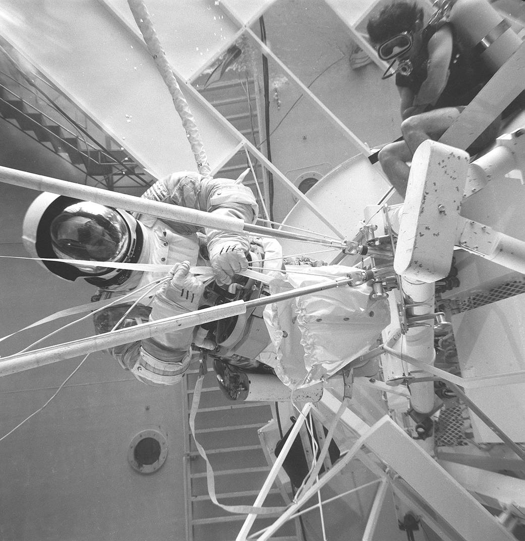 Here, a Skylab crew member practices the repair in Marshall's Neutral Buoyancy Simulator. 