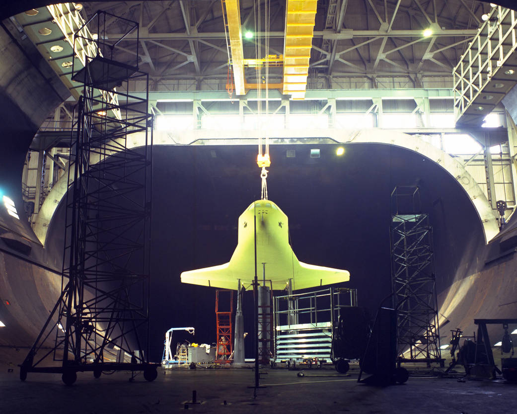 1/3 scale model of the space shuttle preparing for tests in the 40-foot-by-80-foot test section