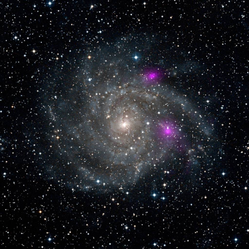 Blazing Black Holes Spotted in Spiral Beauty