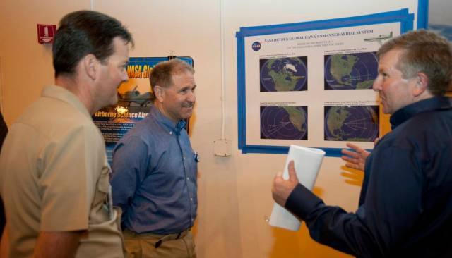 John Grunsfeld, associate administrator of NASA's Science Mission Directorate and a former space shuttle astronaut (center), was