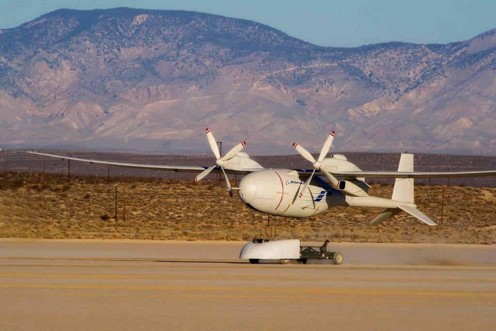 Boeing's Phantom Eye technology demonstration aircraft lifts off its ground cart during takeoff from Rogers Dry Lake at Edwards.