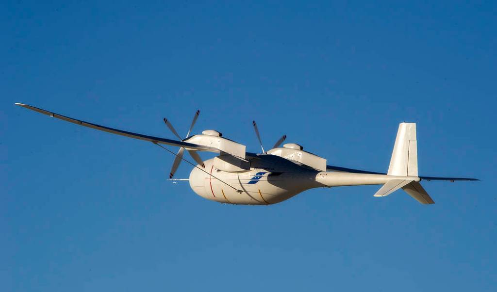 Boeing's Phantom Eye technology demonstration aircraft climbs into a cloudless sky over Edwards Air Force Base.