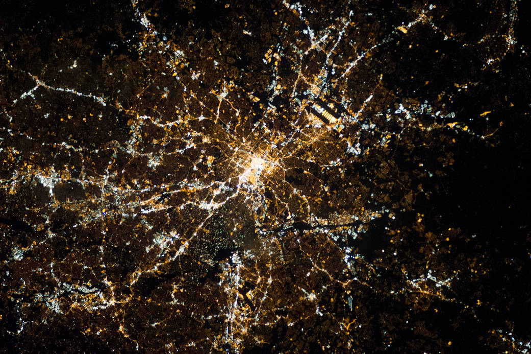 One of the Expedition 34 crew members aboard the International Space Station, flying at an altitude of approximately 240 miles, photographed this vertical night view of the metropolitan area of Atlanta, Georgia.