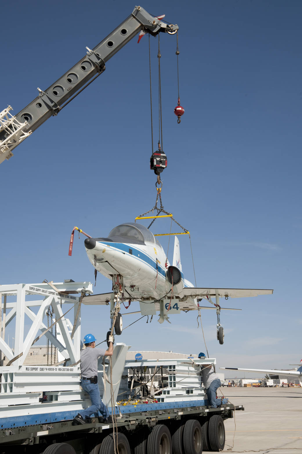 Super Guppy - T-38 Loading For Ferry Flight