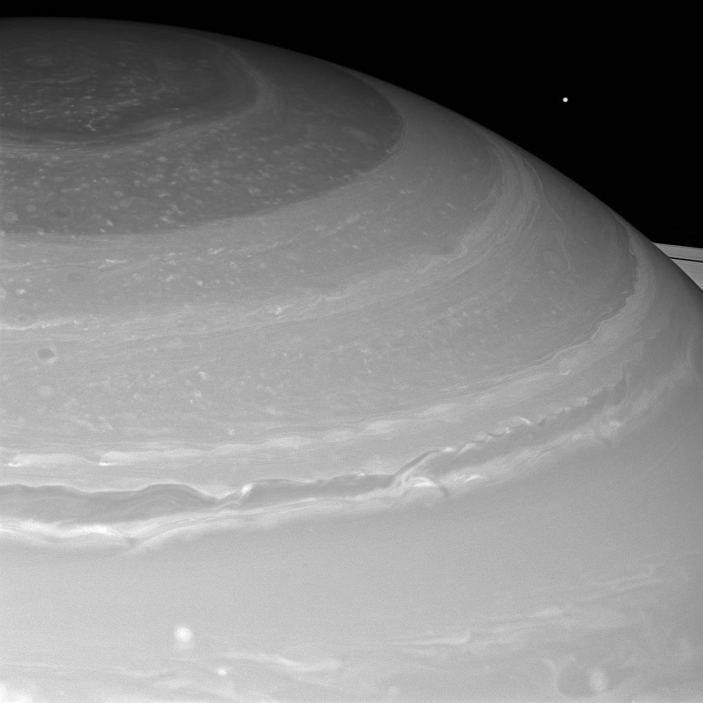 Mimas Peeks Over Saturn