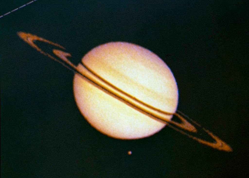 Pioneer 11 Image of Saturn and Its Moon Titan
