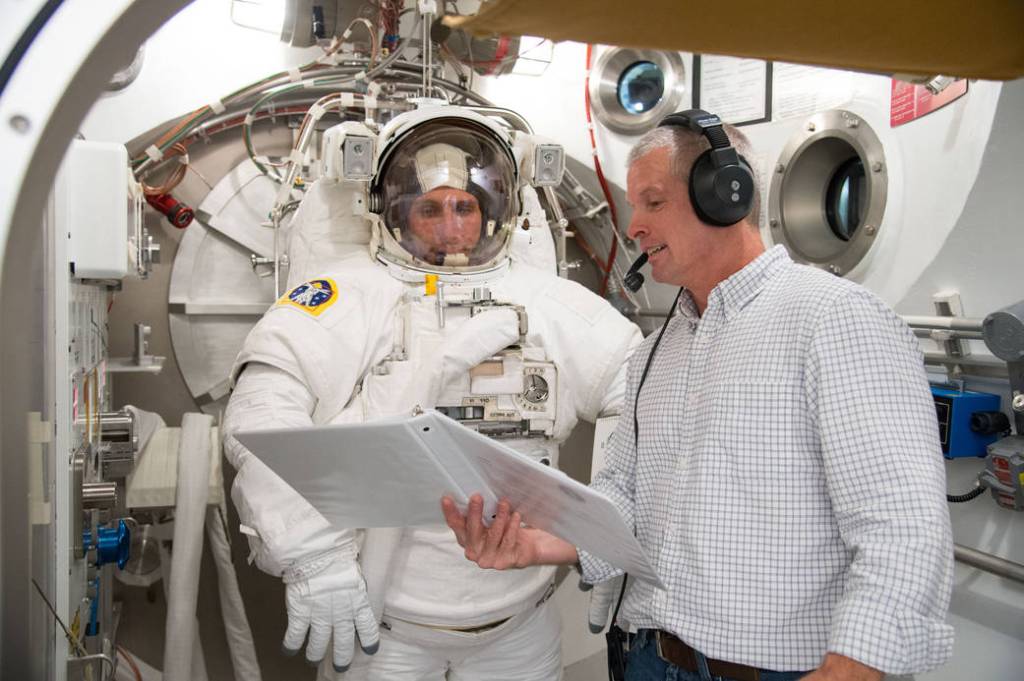 Astronaut Michael Hopkins Participates in Spacesuit Fit Check