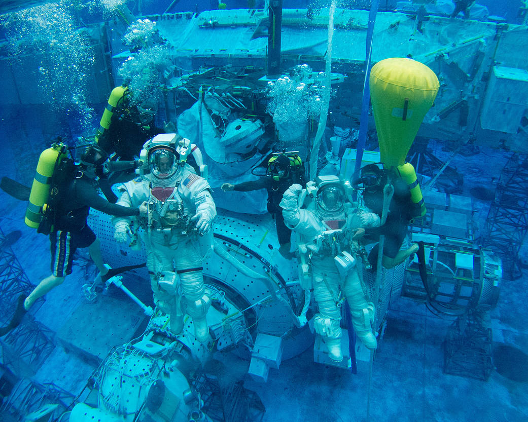 NASA astronauts Steve Swanson and Scott Tingle participate in a spacewalk training session 