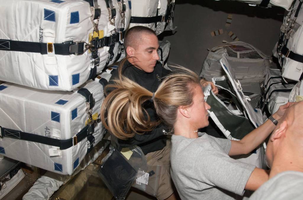 Station Crew Works With ATV-4 Cargo