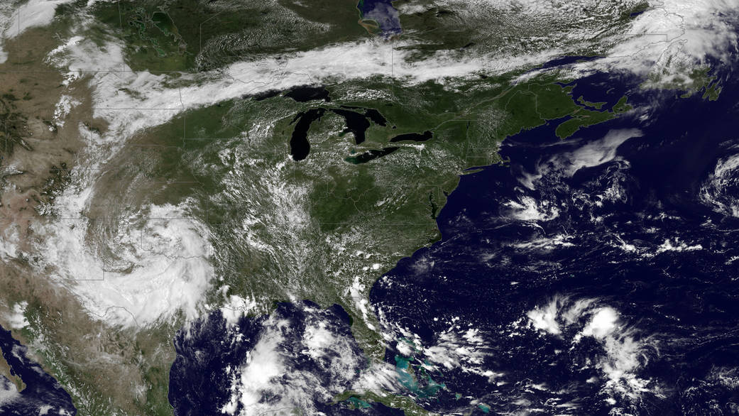 Trapped between an upper level ridge centered over the Ohio Valley and the closed upper level low over the Texas/Oklahoma border