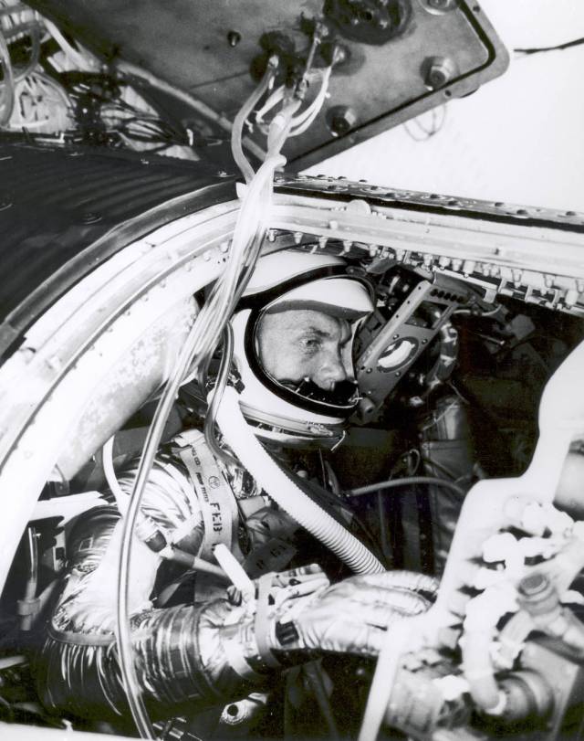 Astronaut John Glenn in spacecraft simulator
