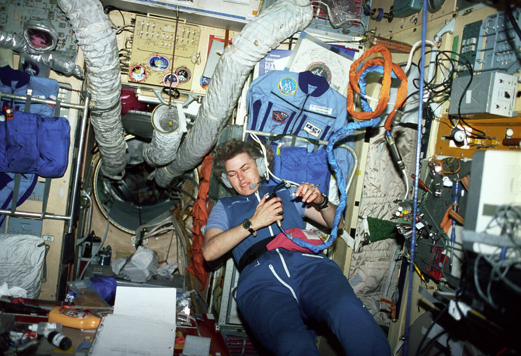 Astronaut Shannon W. Lucid communicates with the ground support team inside the Core Module of the Russian Mir Space Station. 