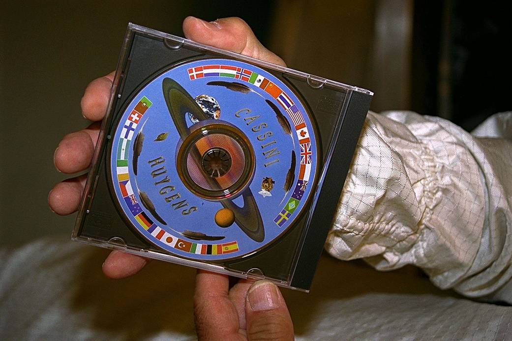 A DVD bearing 616,400 digitized signatures of people from nations around the world is attached to the Cassini spacecraft.