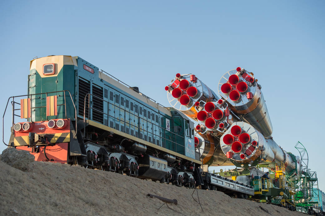The Soyuz rocket is rolled out to the launch pad by train on Monday, Sept. 23, 2013, at the Baikonur Cosmodrome in Kazakhstan.