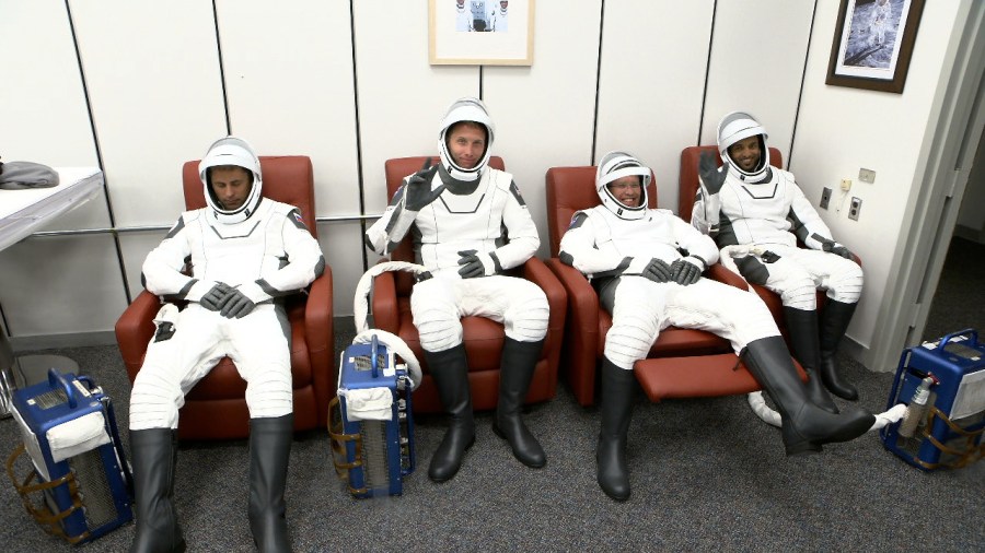 NASA's SpaceX Crew-6 mission crew members in the suit-up room