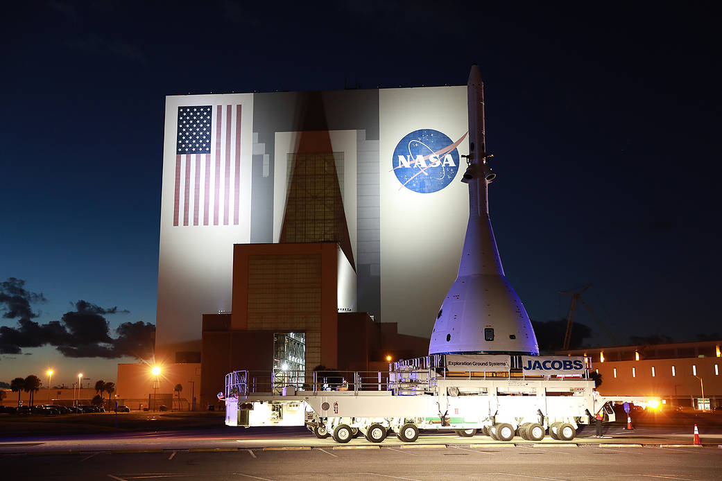 The flight test article for Orion’s AA-2 flight test passes by the VAB at Kennedy Space Center on May 22, 2019.