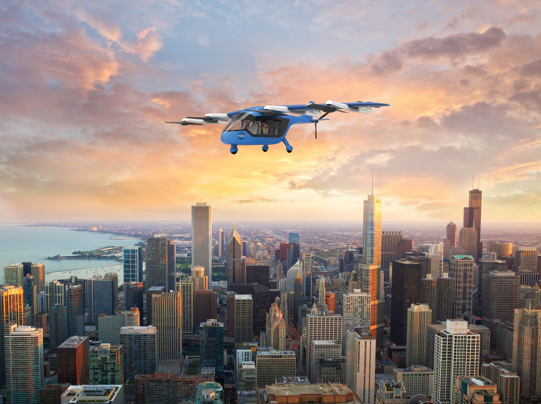 Artist illustration of an unmanned passenger aircraft in flight during sunrise in the city.