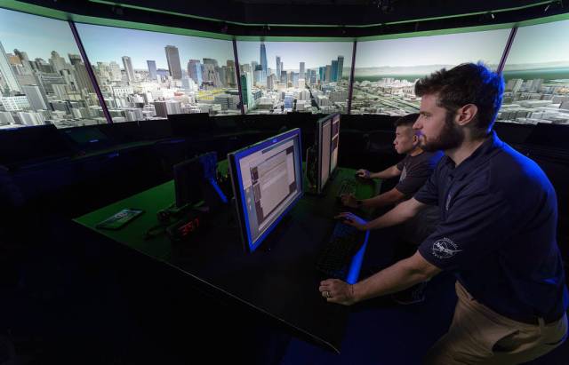 Two users control the FFC visual displays